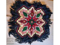 Ethnographic embroidered chair cushion.