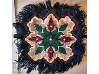 Ethnographic embroidered chair cushion.