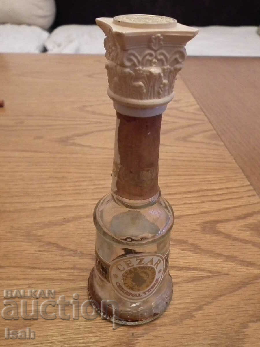 Empty bottle of Cezar Original Vinjak