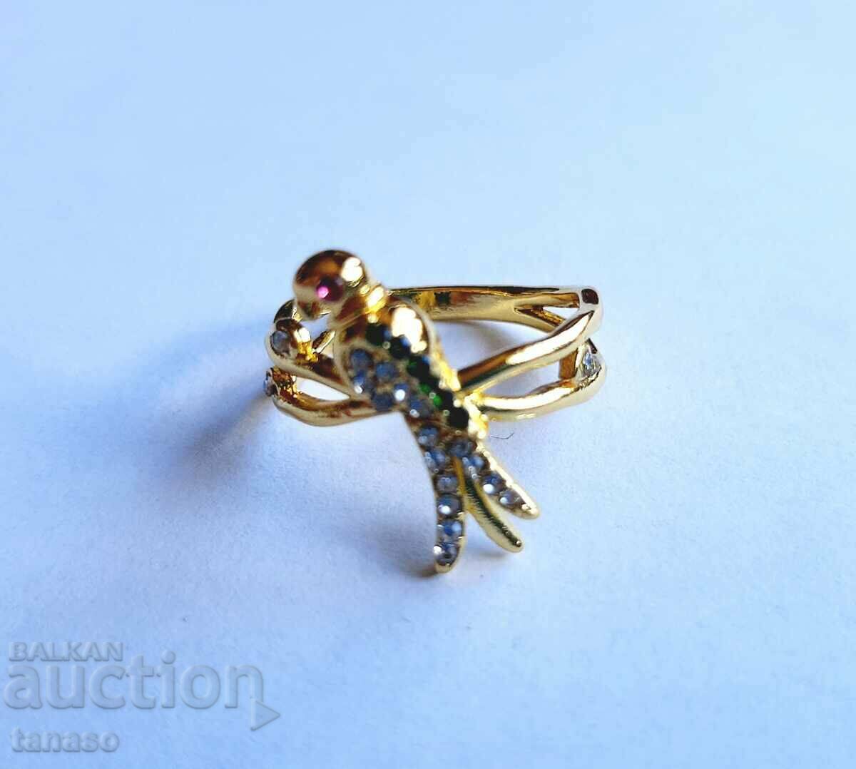 Ring with zircons, bird