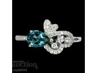 FINE SILVER RING WITH NATURAL BLUE TOPAZ AND ZIRCONIA