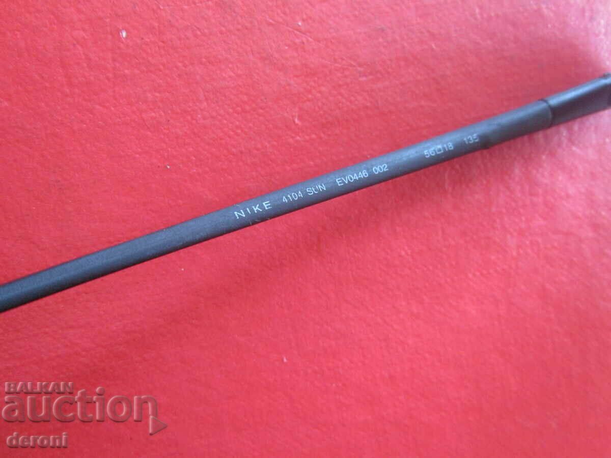 Livrarea Minunați ochelari Nike Temples 4104