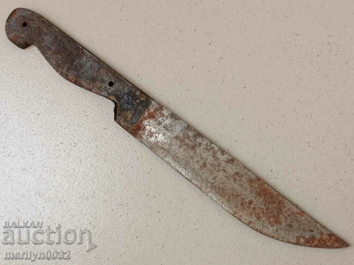 An old knife without a burnt blade, dagger, cortic, rust,