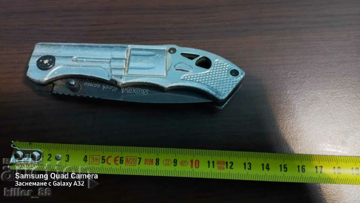 A folding knife in the shape of a revolver with price 20.00 BGN | € 10.23 A folding knife in the shape of a revolver with price 20.00 BGN | € 10.23