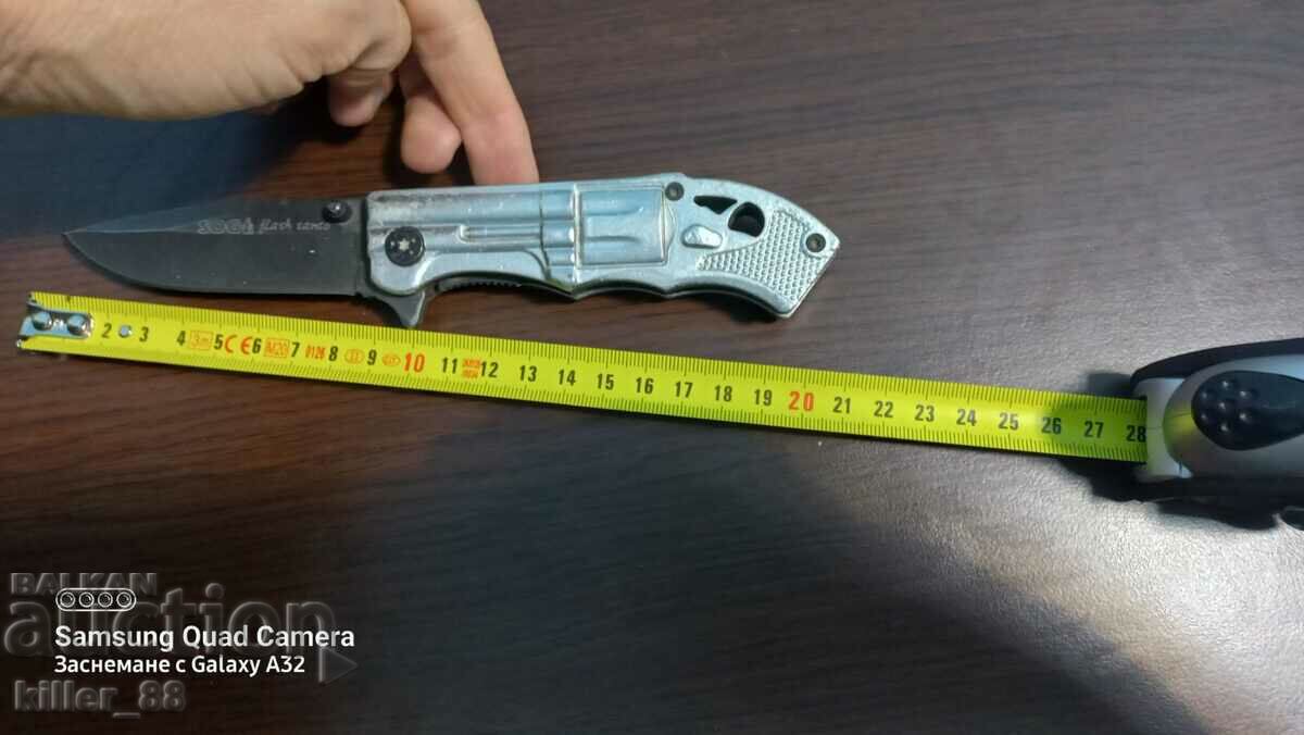 Auction A folding knife in the shape of a revolver Auction A folding knife in the shape of a revolver