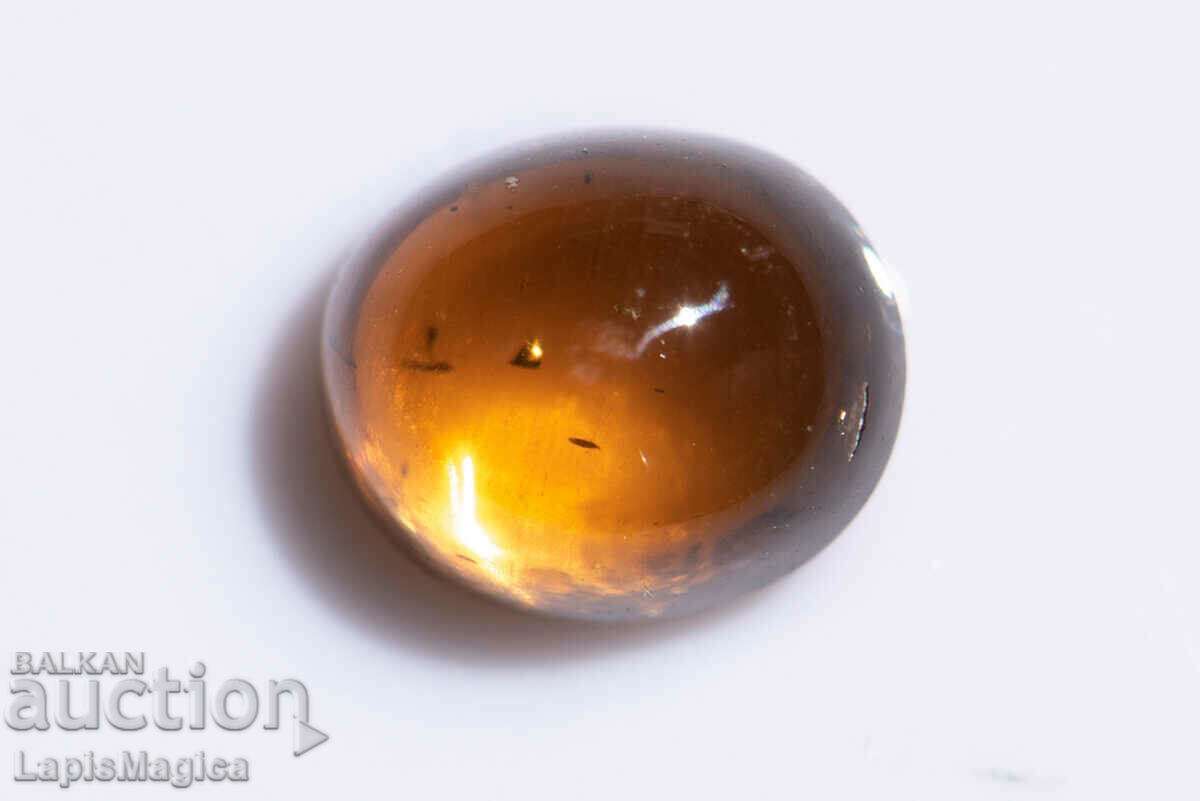 Orange chrysoberyl cabochon 1.60ct oval