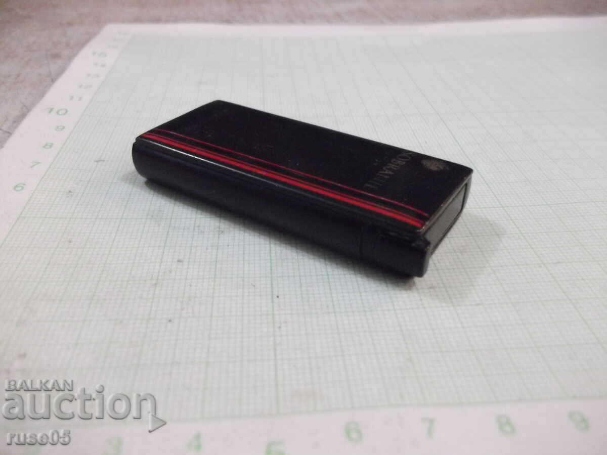 Delivery of Lighter gas "SOBRANIE - LONDON" with a soft flame working Delivery of Lighter gas "SOBRANIE - LONDON" with a soft flame working