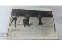 Photo Four female skiers in the mountains