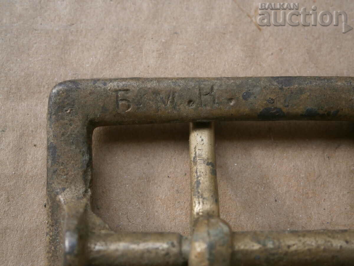 Delivery of buckles from officer's belt BMK and SOC