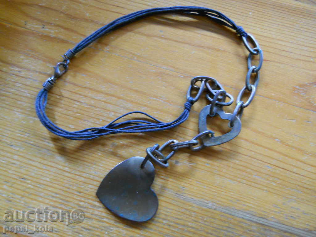 locket on a leather chain