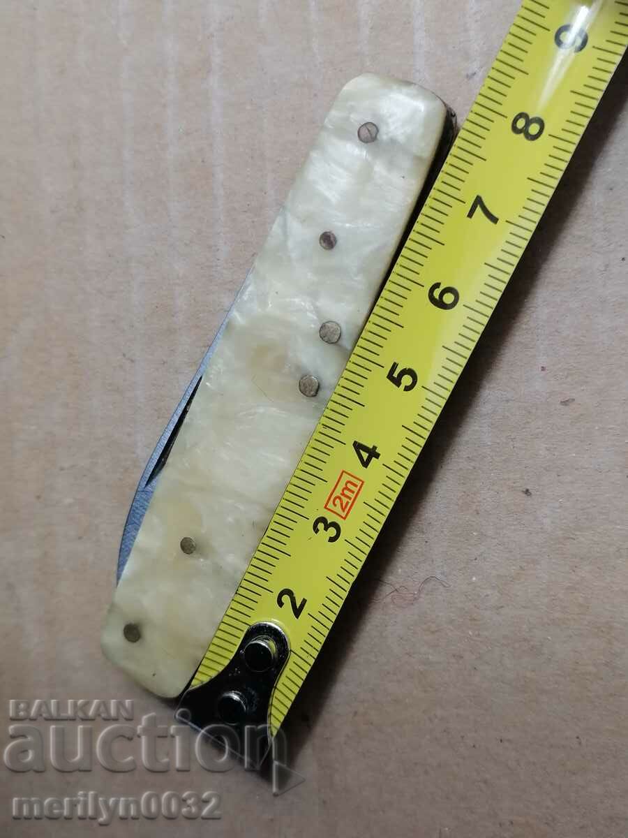 Delivery of Old Soccer knife with sickle and hammer, knife, opener