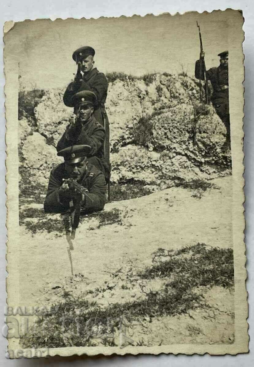 Soldiers with rifles