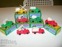 8 toy trucks produced in Hong Kong in 1960.