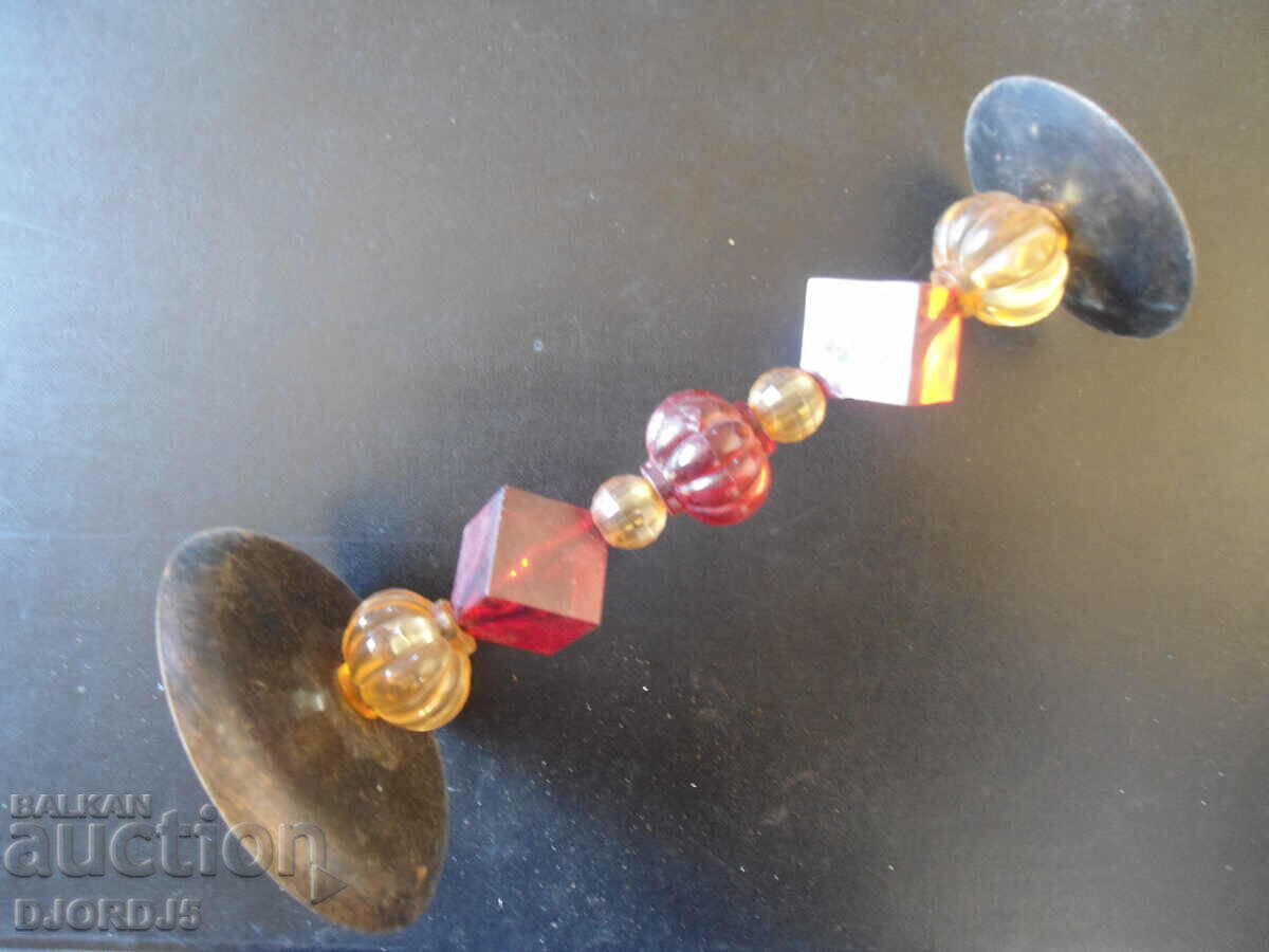 An old metal candleholder with price 5.00 BGN | € 2.56 An old metal candleholder with price 5.00 BGN | € 2.56