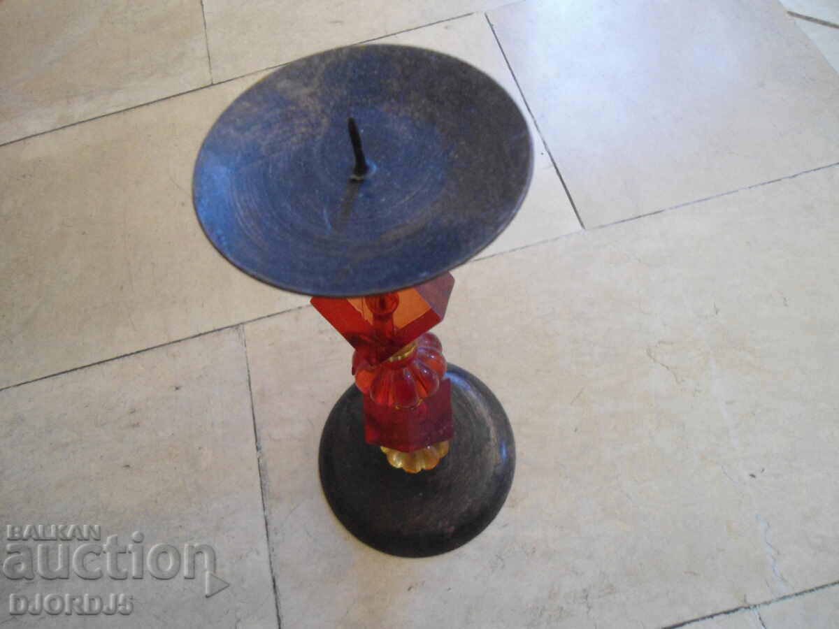 Auction An old metal candleholder Auction An old metal candleholder