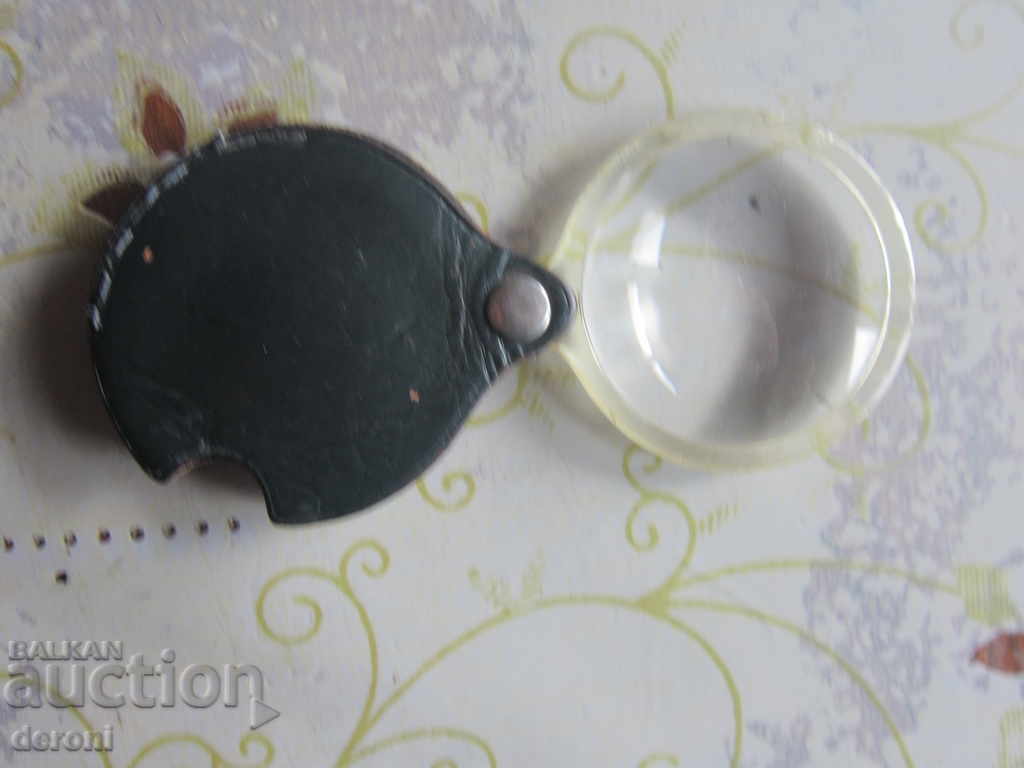 Licitație O veche lupă germană de monede Licitație O veche lupă germană de monede