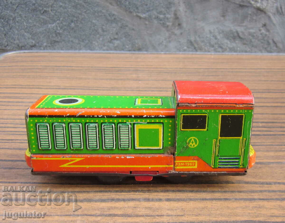 old Russian mechanical metal sheet metal toy locomotive with price 20.00 BGN | € 10.23 old Russian mechanical metal sheet metal toy locomotive with price 20.00 BGN | € 10.23