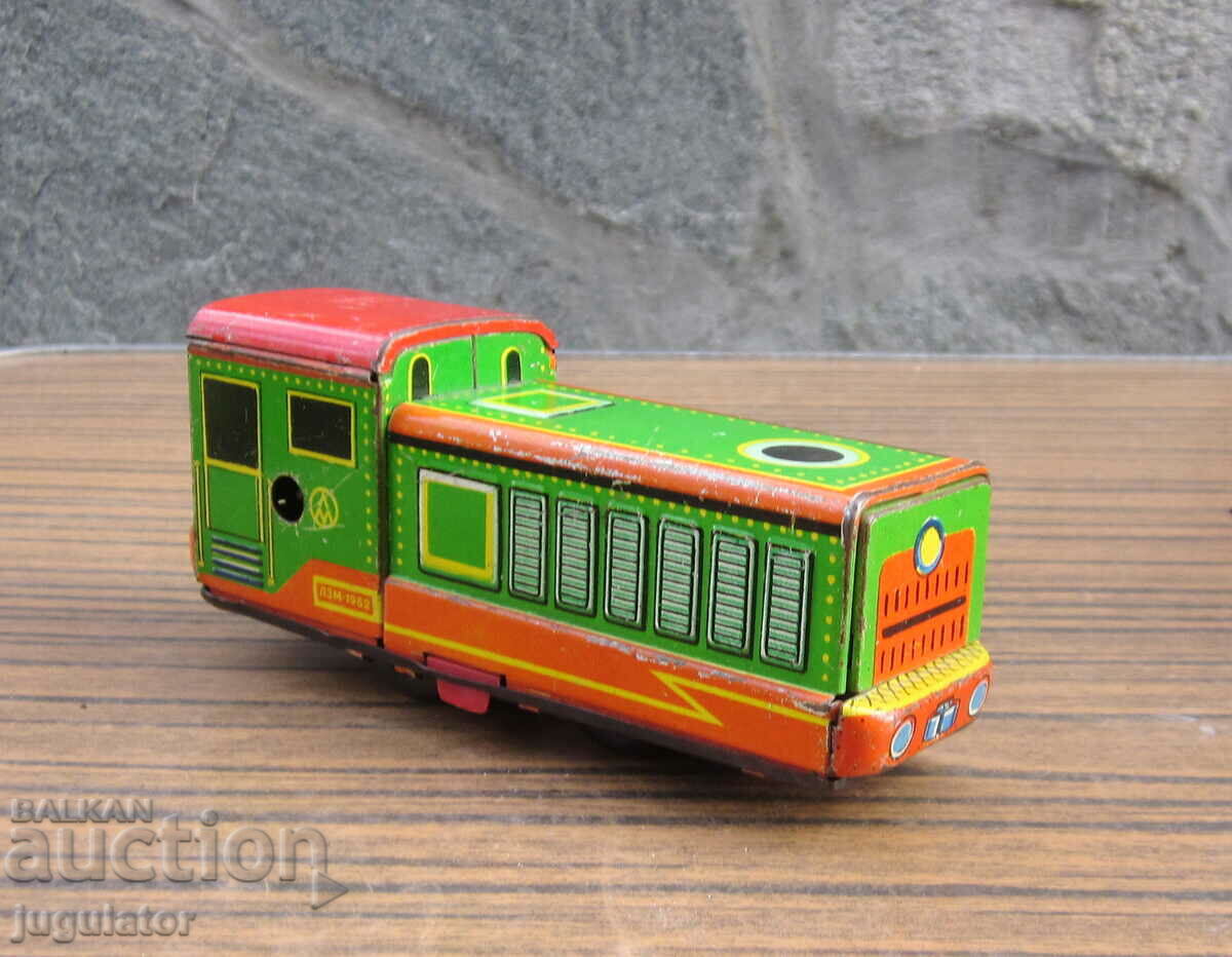 Delivery of old Russian mechanical metal sheet metal toy locomotive Delivery of old Russian mechanical metal sheet metal toy locomotive