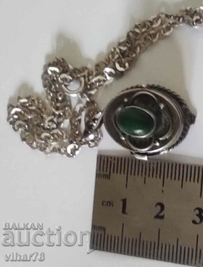 Auction  SILVER PENDANT WITH HIDDEN