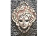 A brooch. Venetian mask