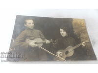 Photo Ferdinand Boy with violin and girl with guitar 1924