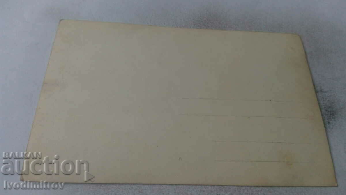 Photo A man and three children in front of a wooden fence with price 1.15 BGN | € 0.59