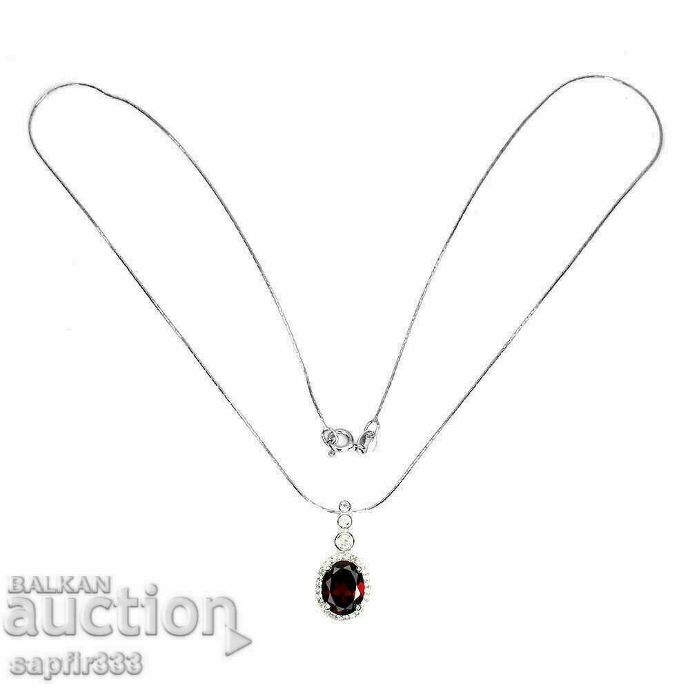 Auction FINE SILVER MEDALLION WITH NATURAL GARNET AND TOPAZS Auction FINE SILVER MEDALLION WITH NATURAL GARNET AND TOPAZS