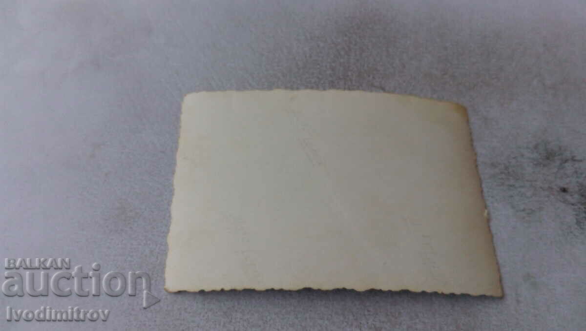 Photo Men and women on a railway station platform with price 2.45 BGN | € 1.25