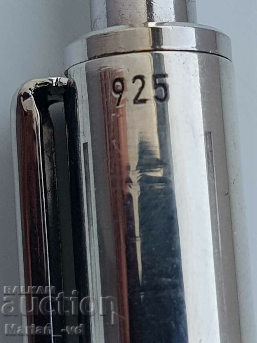 Auction  A silver pen