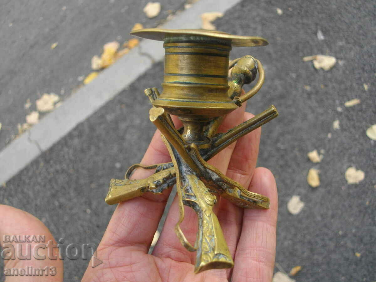 Delivery of OLD BRONZE CANDLESTICK LAVA MOTIFS