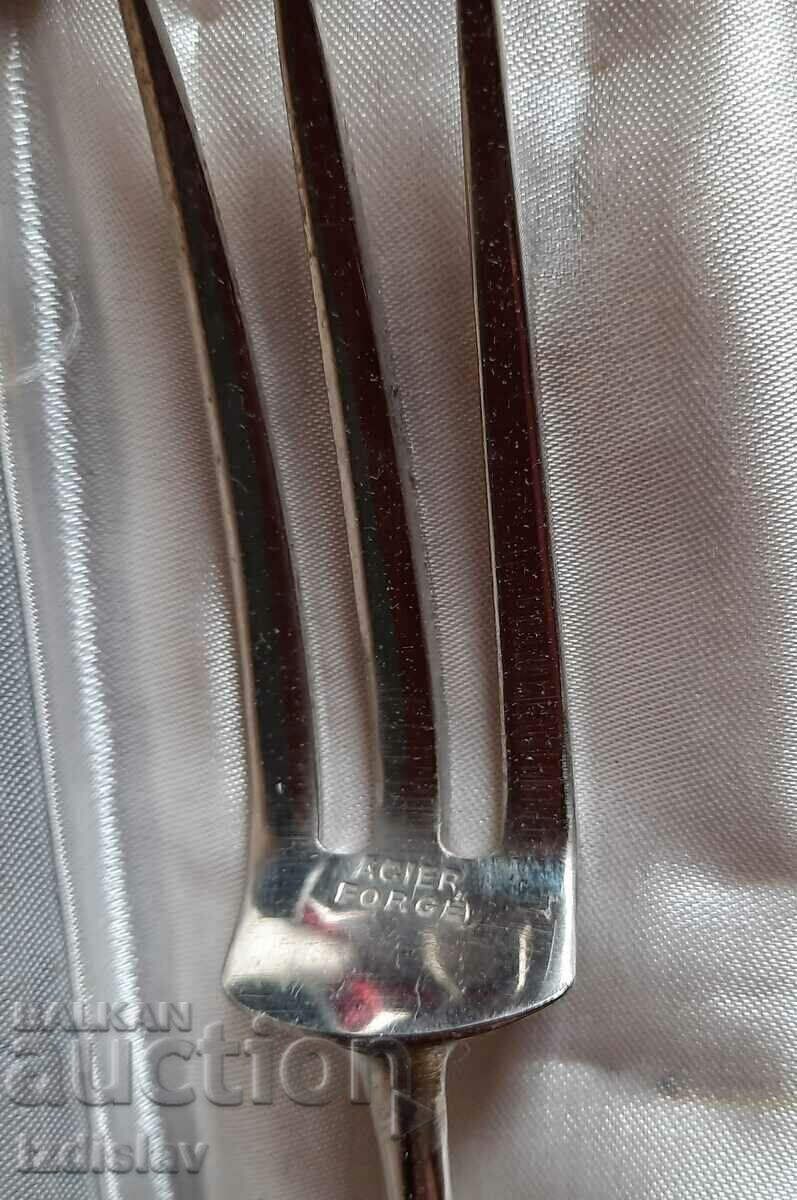 Livrarea Furculiță de servire antică.