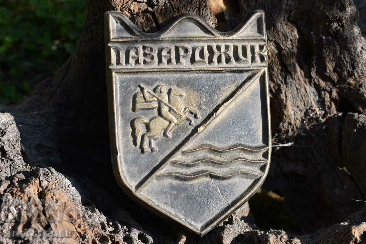 Emblema din placă de bronz