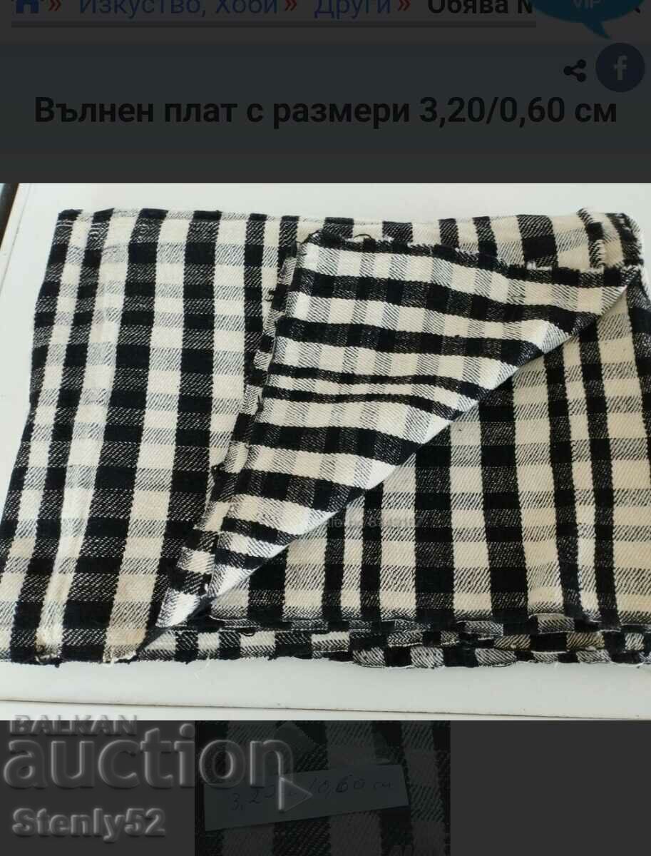 Black and white patterned woolen fabric measuring 3.60m/0.60cm