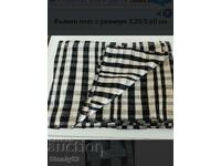 Black and white patterned woolen fabric measuring 3.60m/0.60cm