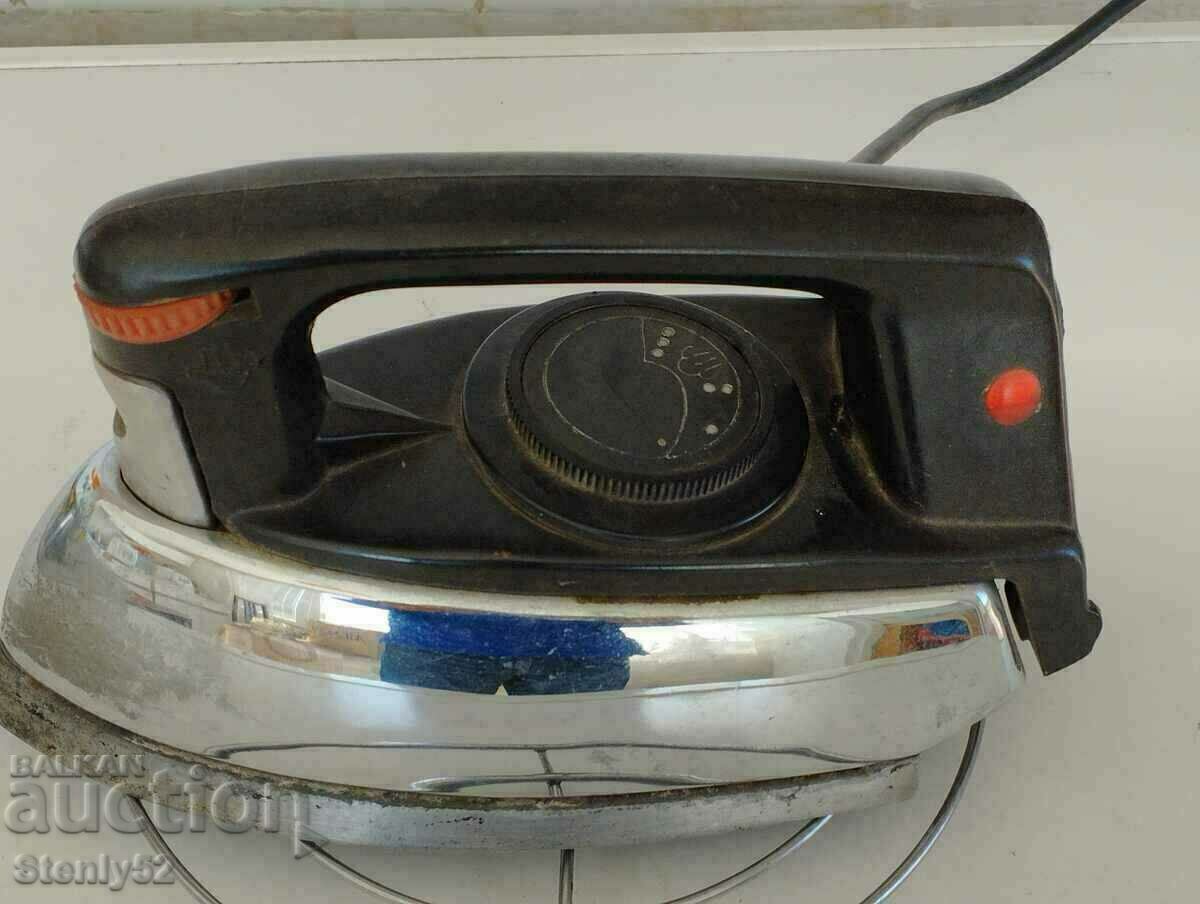 Old electric steam iron from the USSR