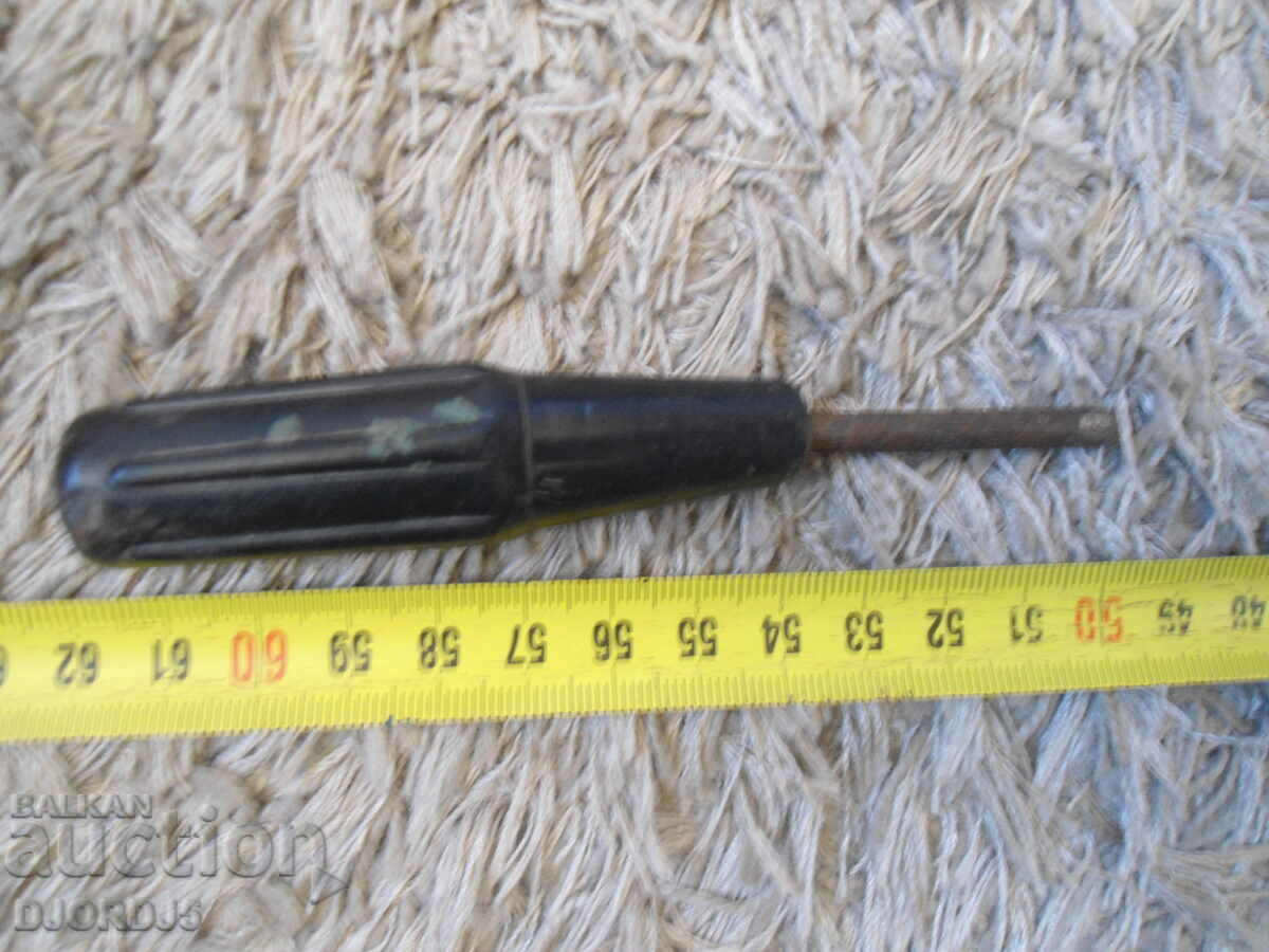 Delivery of An old small screwdriver Delivery of An old small screwdriver