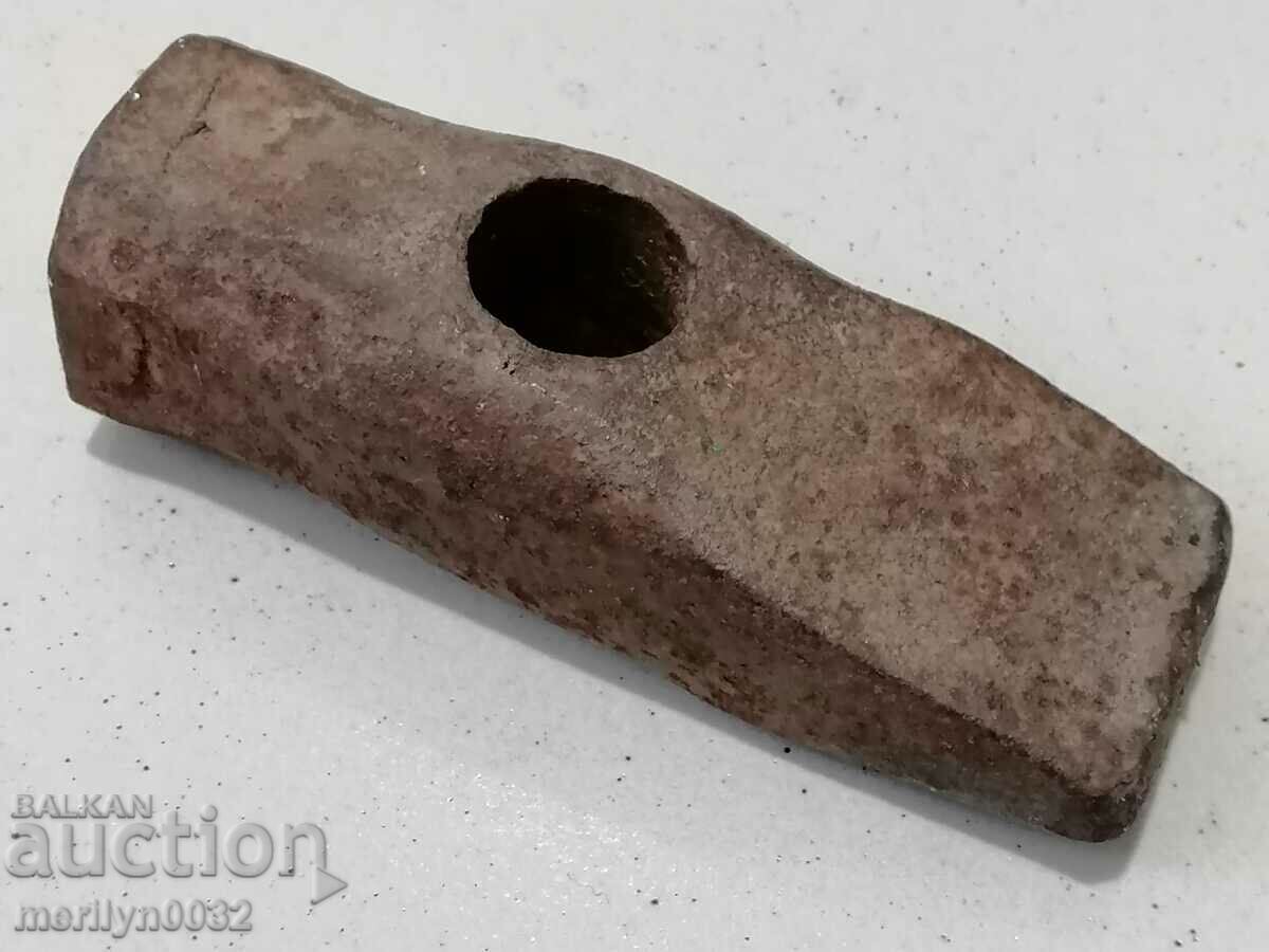 Delivery of An old stone hammer, a tool, a kink Delivery of An old stone hammer, a tool, a kink