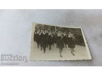Photo Procession of girls' brass band