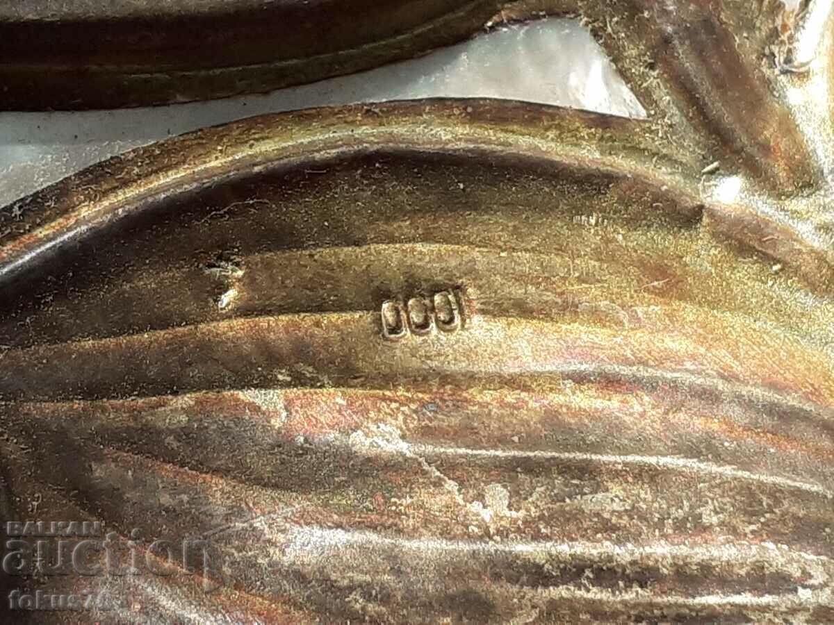 Delivery of Large mother-of-pearl shell with silver appliqué Delivery of Large mother-of-pearl shell with silver appliqué