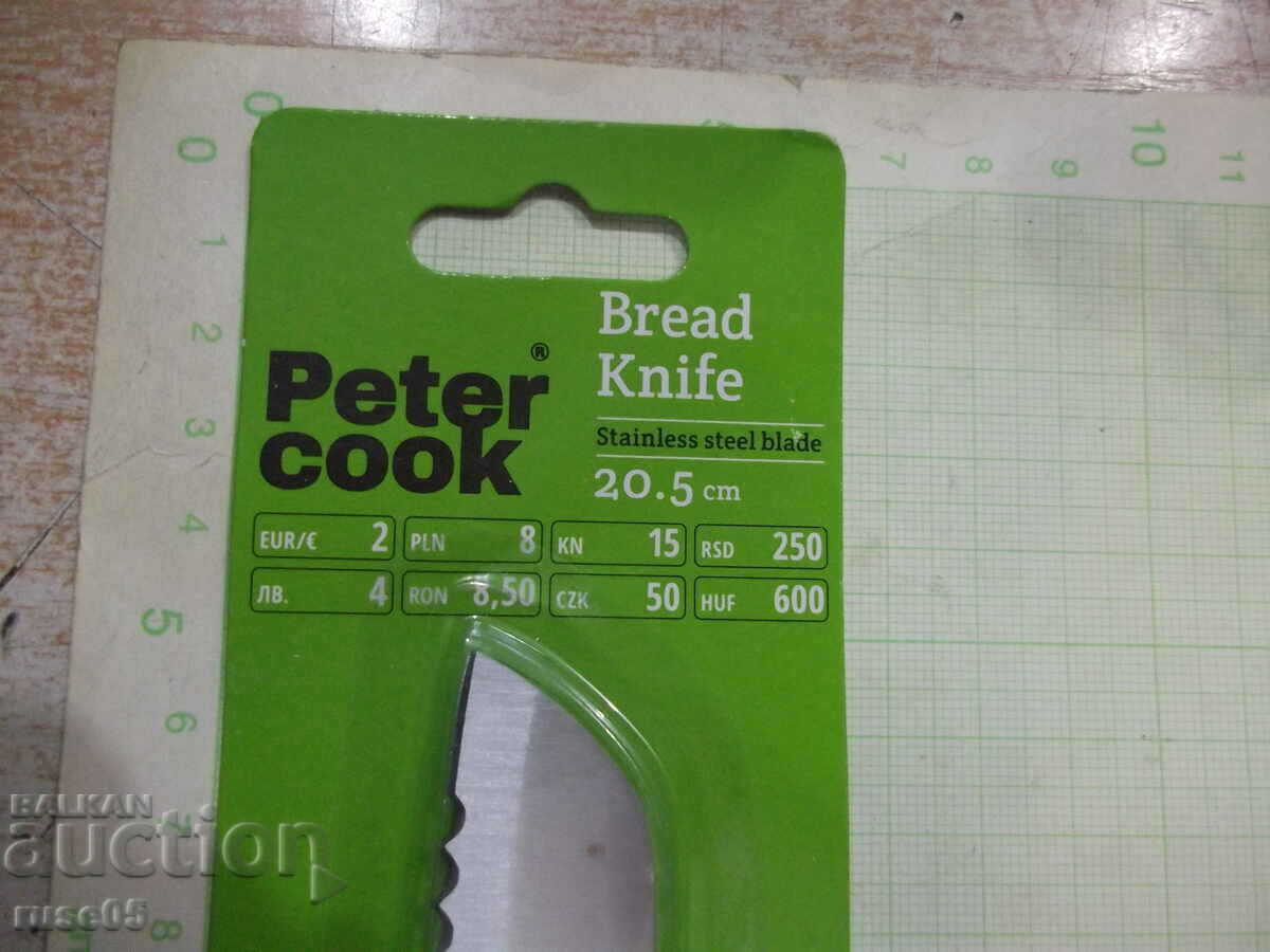 Auction "Peter cook" bread knife new Auction "Peter cook" bread knife new