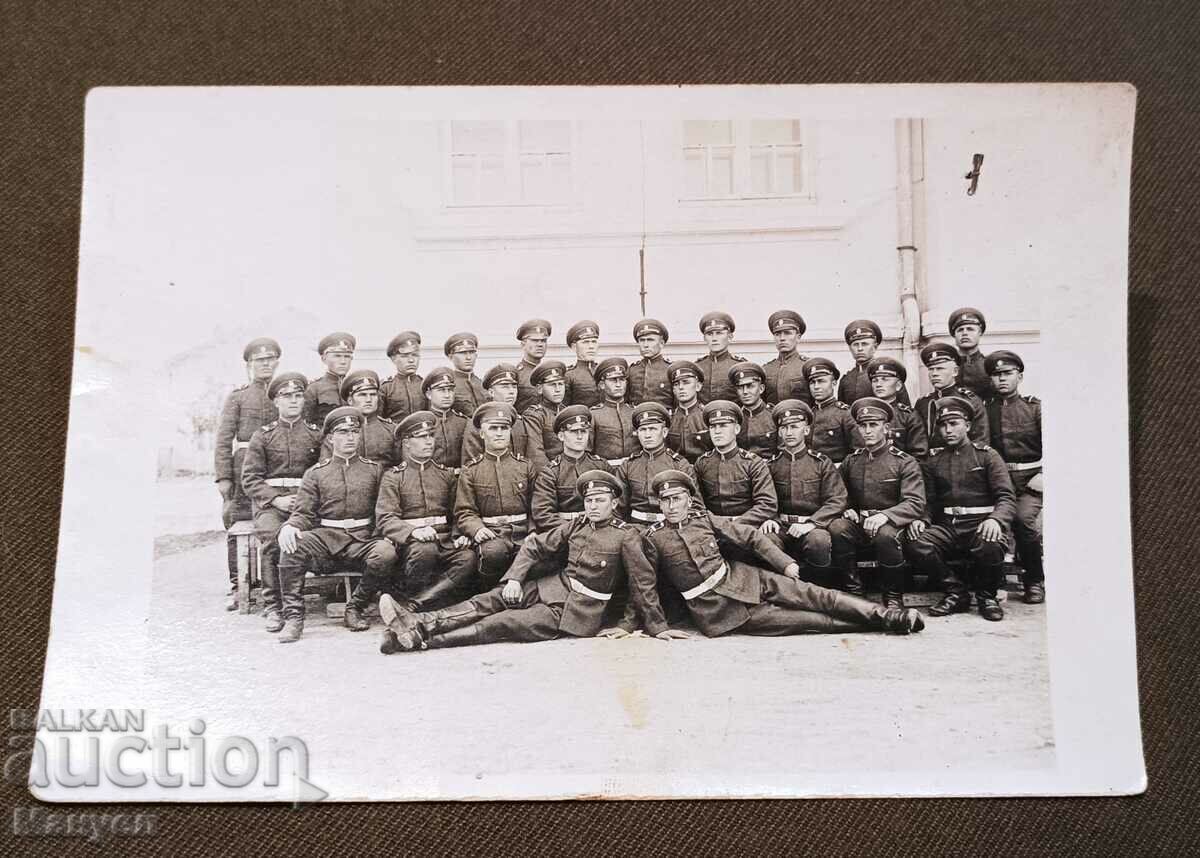 Old military photo - cavalrymen.