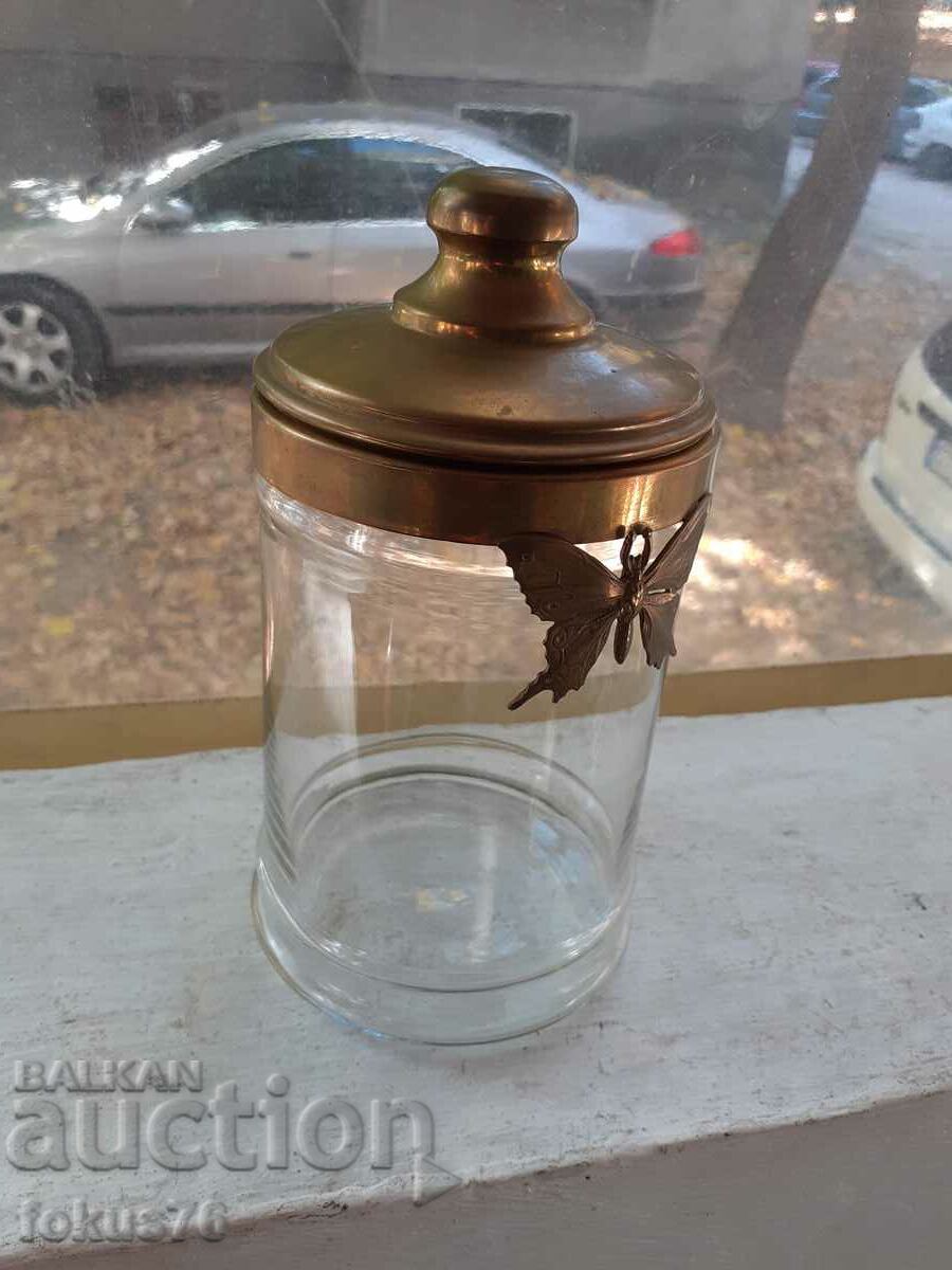 Vintage glass candy jar with metal butterfly lid with price 95.00 BGN | € 48.57 Vintage glass candy jar with metal butterfly lid with price 95.00 BGN | € 48.57