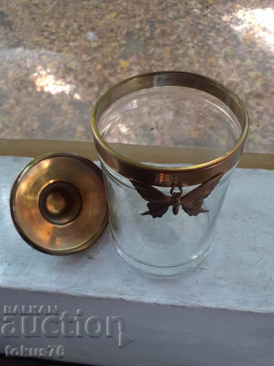 Delivery of Vintage glass candy jar with metal butterfly lid Delivery of Vintage glass candy jar with metal butterfly lid
