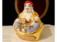 Chinese porcelain Buddha figure, gold, feng shui.