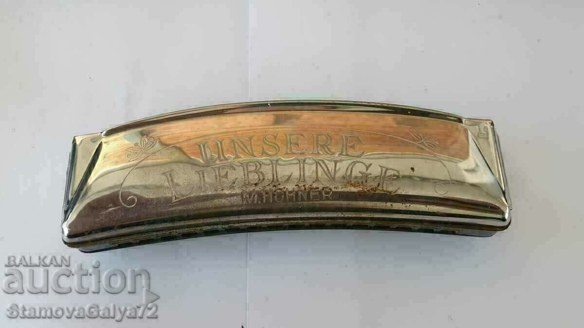 Delivery of Antique German Hohner Unsere Lieblinge Harmonica