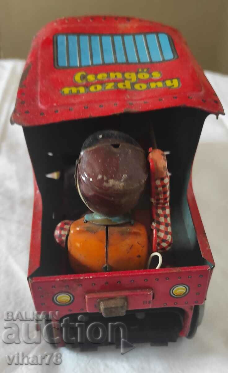 Auction an old tin toy Auction an old tin toy
