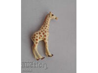 Figure, animals: giraffe.