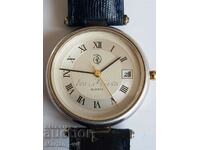 Quartz wrist watch with silver case