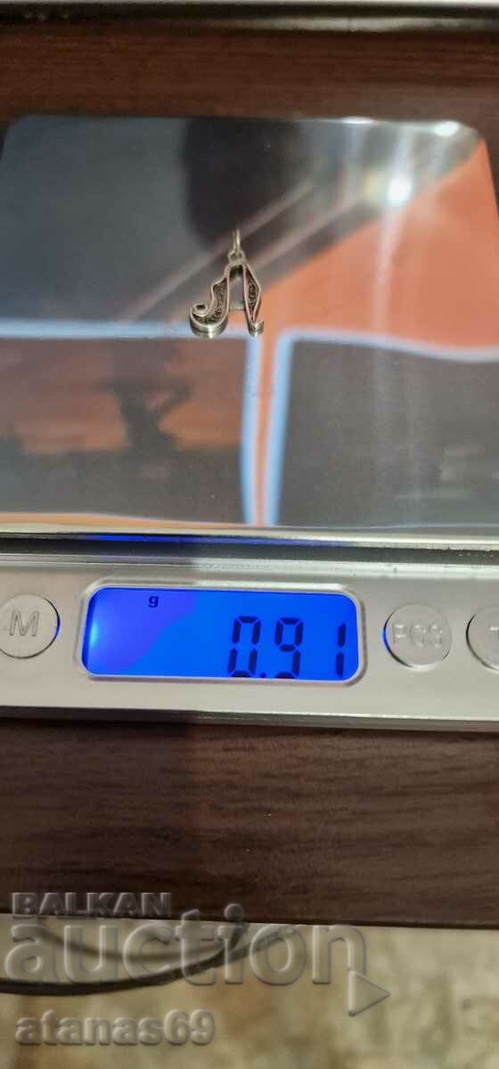 Auction  Silver pendant - 0.91 g.