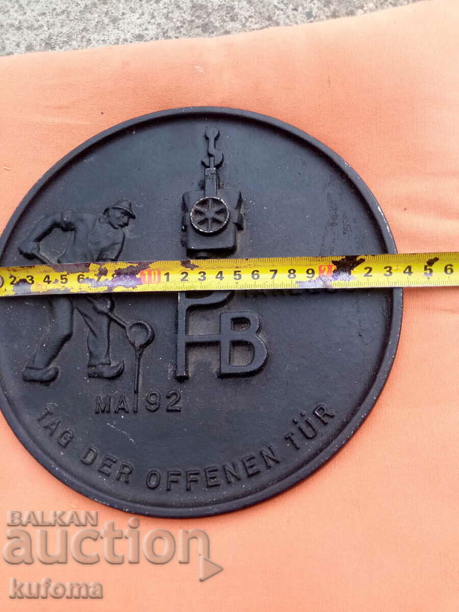 An old cast iron plate with price 39.99 BGN | € 20.45 An old cast iron plate with price 39.99 BGN | € 20.45